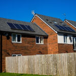 English House with Solar Panels on roof for electisity