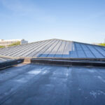 an flat roof on a high building